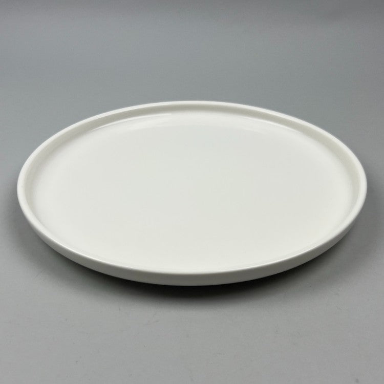 OSARA New York Spruce Ceramic White Round Plate with Upright Rim Shot from angle