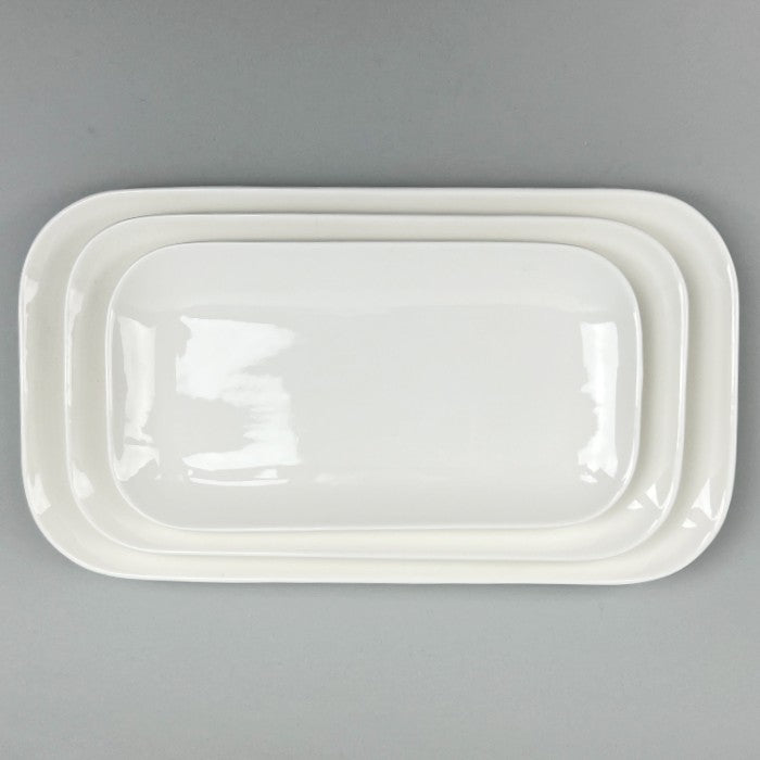 Spruce White Oval Tall Flared Rim Plates in 3 sizes, 8", 11", and 13.5" wide